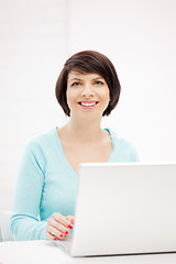 Image showing happy woman with laptop computer