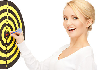 Image showing businesswoman with dart and target
