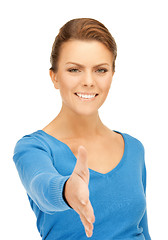 Image showing woman with an open hand ready for handshake