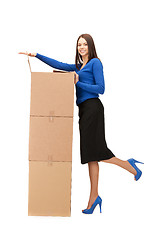 Image showing attractive businesswoman with big boxes