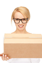 Image showing attractive businesswoman with cardboard box