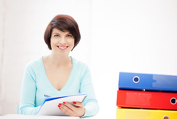 Image showing woman with folders