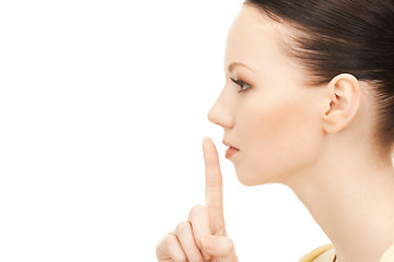 Image showing finger on lips