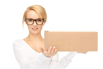 Image showing attractive businesswoman with cardboard box