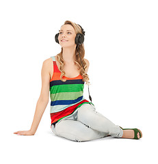 Image showing happy teenage girl in big headphones