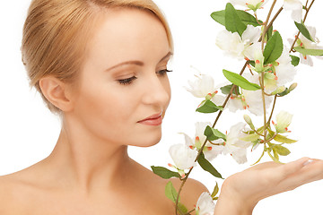 Image showing beautiful woman with orchid flower