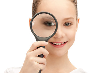 Image showing teenage girl with magnifying glass