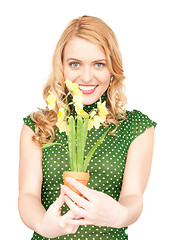 Image showing lovely housewife with flower