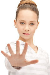 Image showing teenage girl making stop gesture