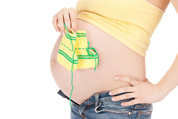 Image showing pregnant woman belly and socks