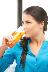 Image showing beautiful woman with glass of juice