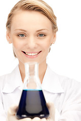 Image showing lab worker holding up test tube