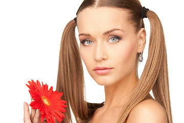 Image showing lovely woman with red flower