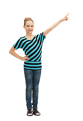 Image showing teenage girl pointing her finger