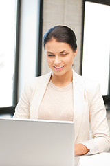 Image showing happy woman with laptop computer