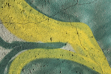 Image showing Graffiti on a cracked concrete wall