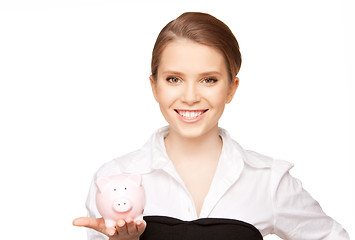 Image showing lovely woman with piggy bank