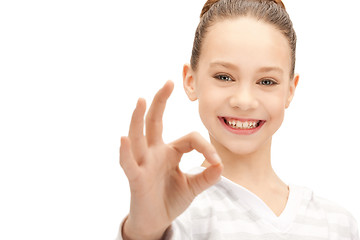 Image showing lovely teenage girl showing ok sign