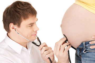 Image showing doctor and pregnant woman belly