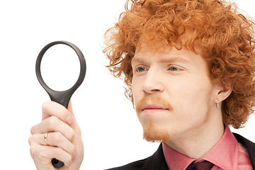 Image showing man with magnifying glass