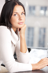 Image showing calm and serious woman