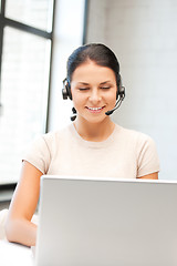 Image showing helpline operator with laptop computer