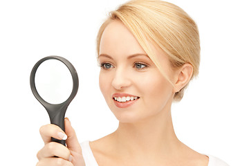 Image showing woman with magnifying glass