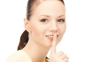 Image showing finger on lips