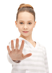 Image showing teenage girl making stop gesture