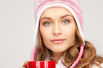 Image showing woman with red mug