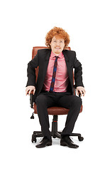 Image showing young businessman sitting in chair