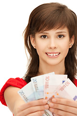 Image showing teenage girl with euro cash money