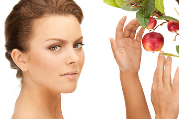 Image showing lovely woman with apple twig