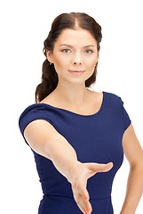 Image showing woman with an open hand ready for handshake