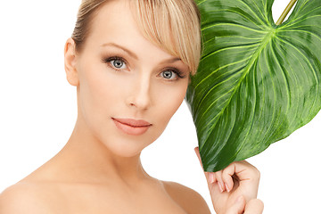 Image showing woman with green leaf