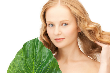 Image showing woman with green leaf