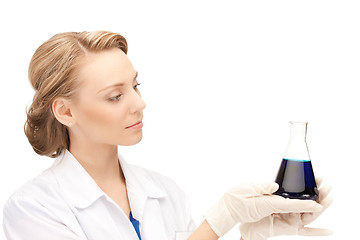 Image showing lab worker holding up test tube