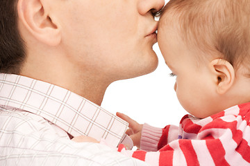 Image showing happy father with adorable baby