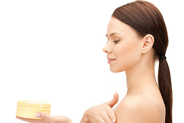 Image showing beautiful woman with moisturizing creme