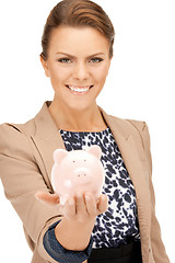 Image showing lovely woman with piggy bank