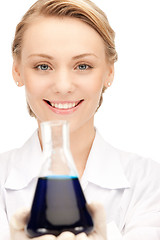 Image showing lab worker holding up test tube