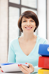 Image showing woman with folders