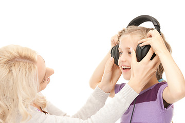Image showing mother and little girl with headphones