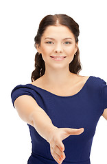 Image showing woman with an open hand ready for handshake