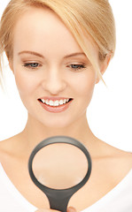 Image showing woman with magnifying glass