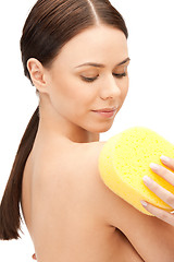 Image showing beautiful woman with sponge