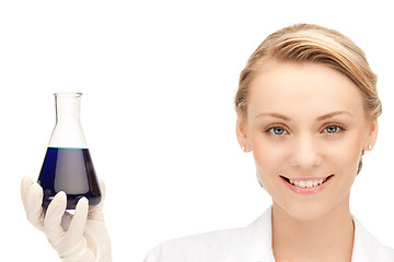 Image showing lab worker holding up test tube