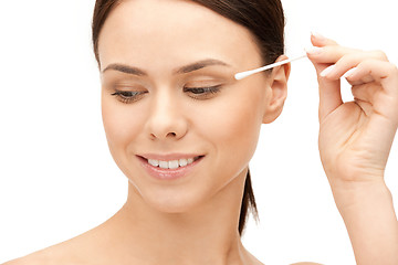 Image showing beautiful woman with cotton bud