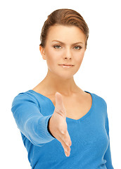 Image showing woman with an open hand ready for handshake