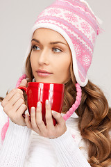 Image showing woman with red mug